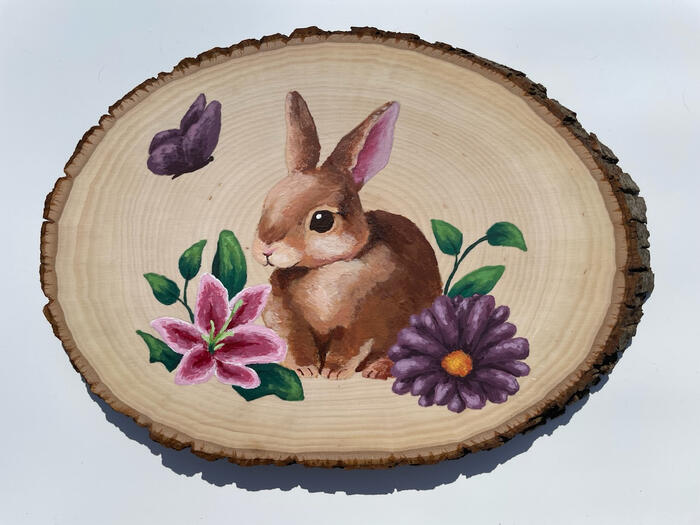 Springtime Hideaway - acrylic painting on a wood slice